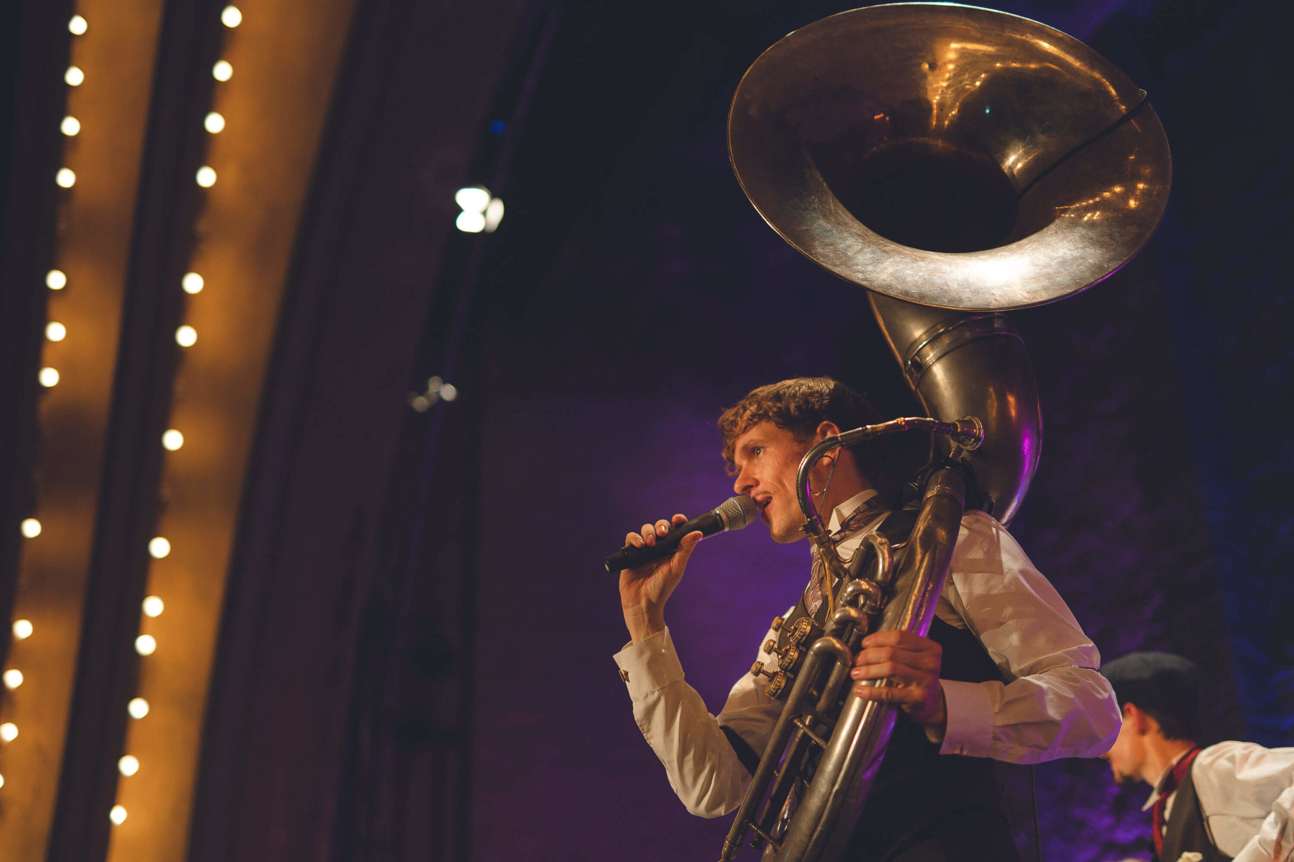 sousaphone player at concert of Rufus Temple Orchestra with Ali Affleck at Delphi theatre in Berlin