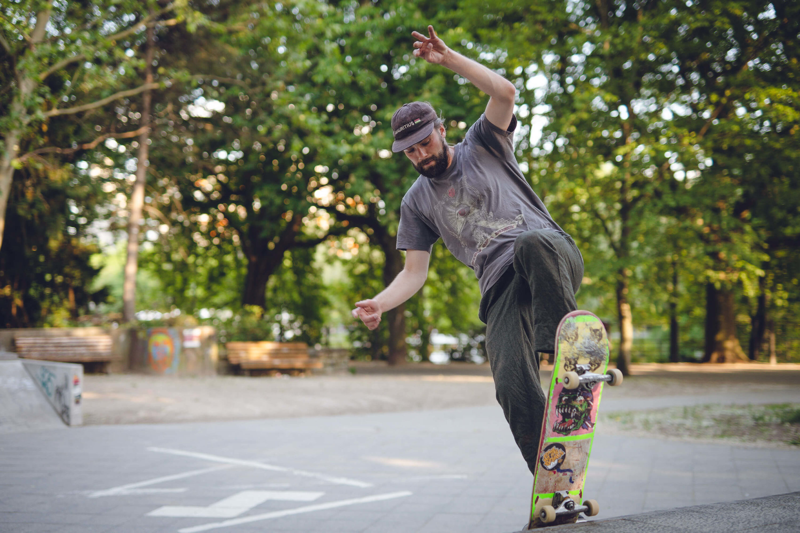 musician Finn of band Auburn light drives skate board in skate park Berlin